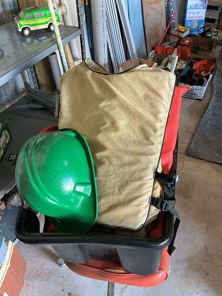 Vintage swivel desk chair, hard hat, flotation vests, tote