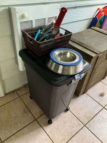 Dog dish, pet brushes, rolling tote