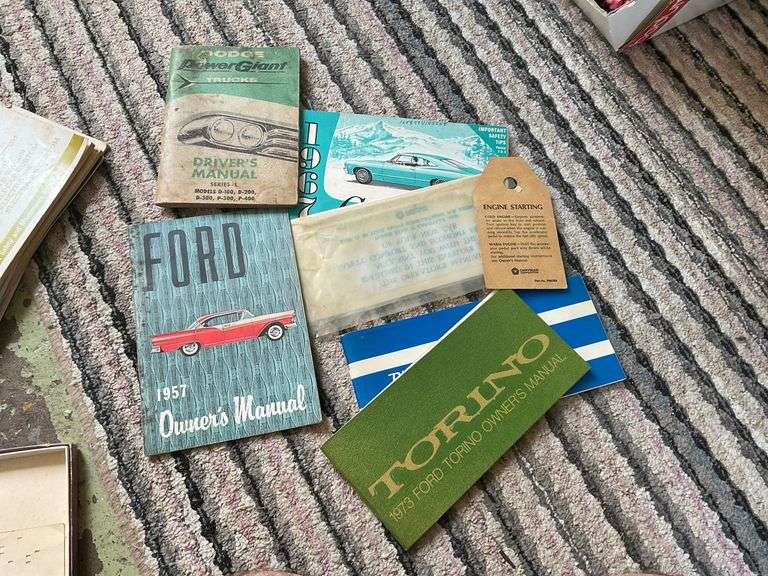 Vintage car manual collection and auto literature