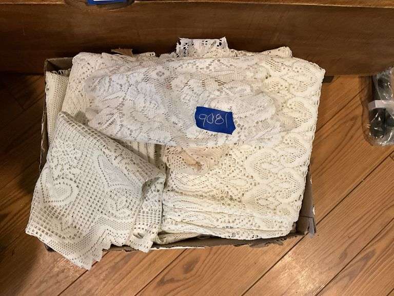Contents of chest: lace and linens