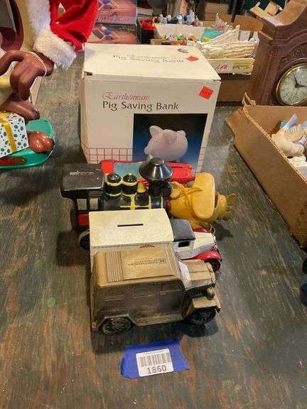 Figural banks including: trucks, locomotive, car, pig