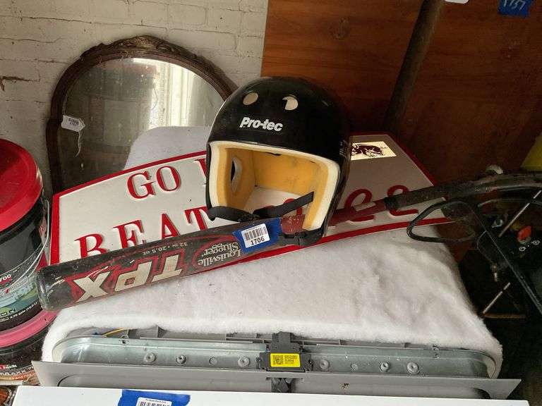 Pro-Tec skate helmet, GO HOGS sign, Louisville Slugger TPX baseball bat