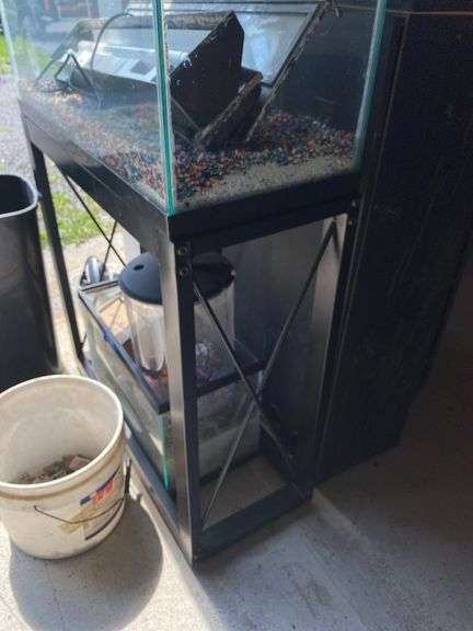 Aquarium on stand and two other aquariums, and accessories