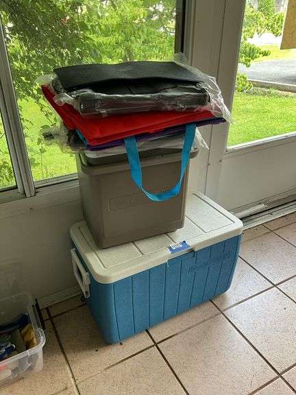 Two Coleman coolers and tote bags