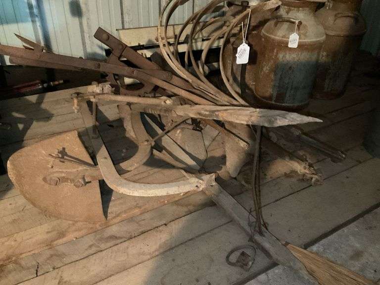 Assorted plows and parts, *** PLEASE NOTE: This item has no stair access and must be picked up on July 15th between 11:00-1:30PM. Item will be removed from loft for pickup.