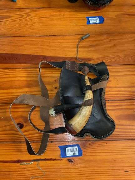 Two powder horns and leather pouch w/ contents