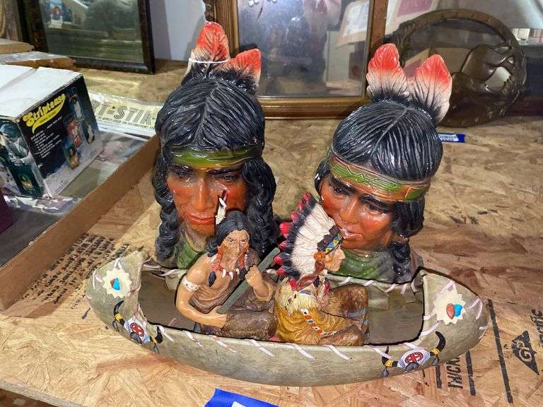 Native Americans in canoe figurine, two chalkware Native American heads - not all perfect