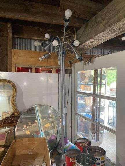 Two multi-lite adjustable arm floor lamps