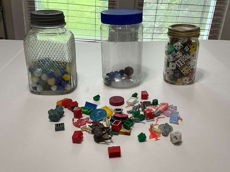 Jars of marbles, dice, and trinkets