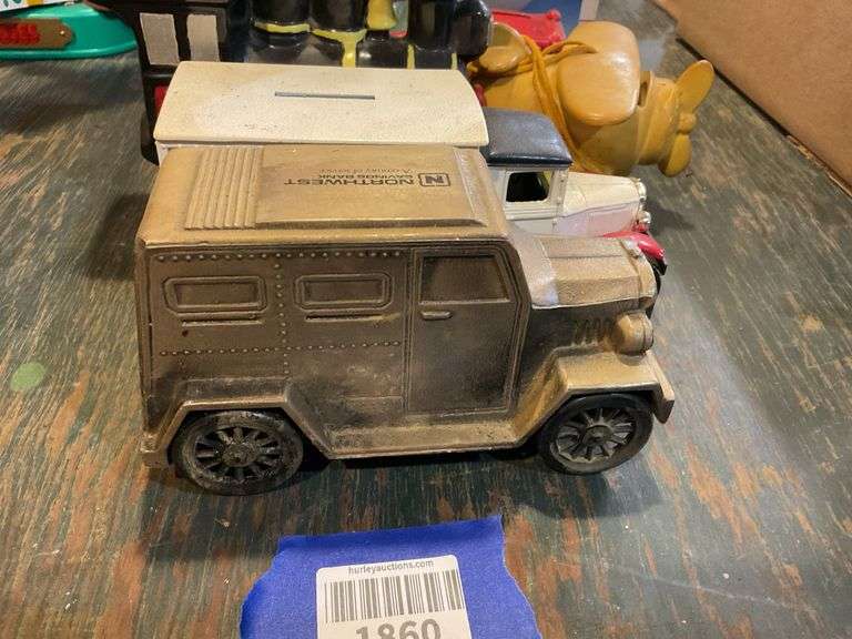 Figural banks including: trucks, locomotive, car, pig