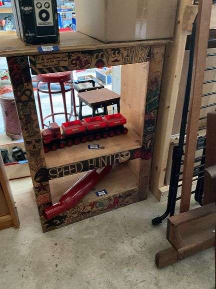 Wooden shelf unit covered w/ drawings - no contents 27.5x37x16.5