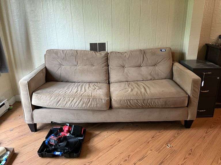Tan upholstered sofa 78in long