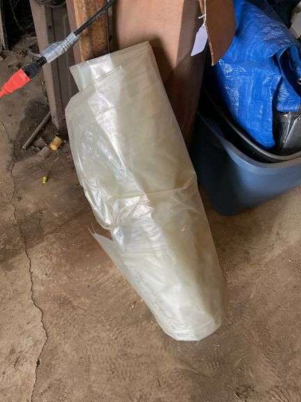 Roll of plastic sheeting