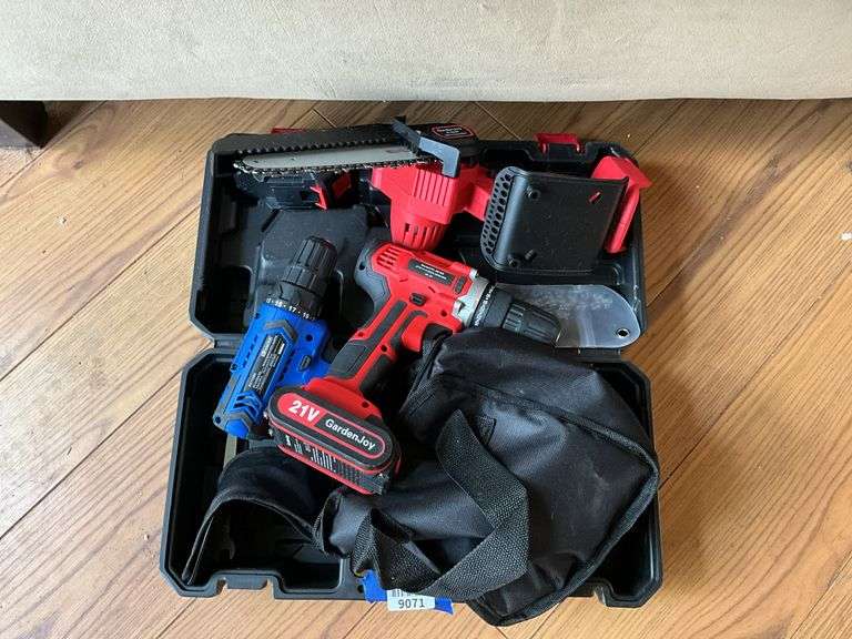 Cordless tool kit: two drills, mini chainsaw, charger