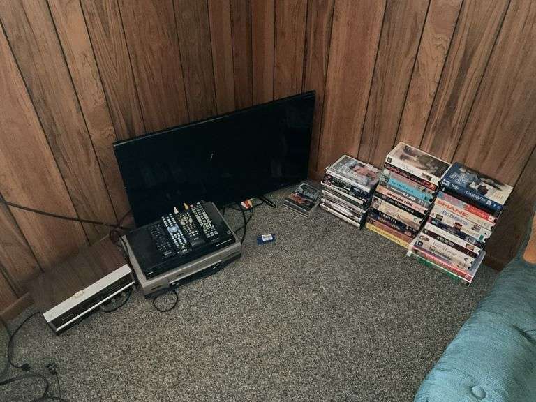Element TV model: ELEFW328, RCA VHS player, Zenith AM/FM radio, CDs, DVDs, VHS tapes
