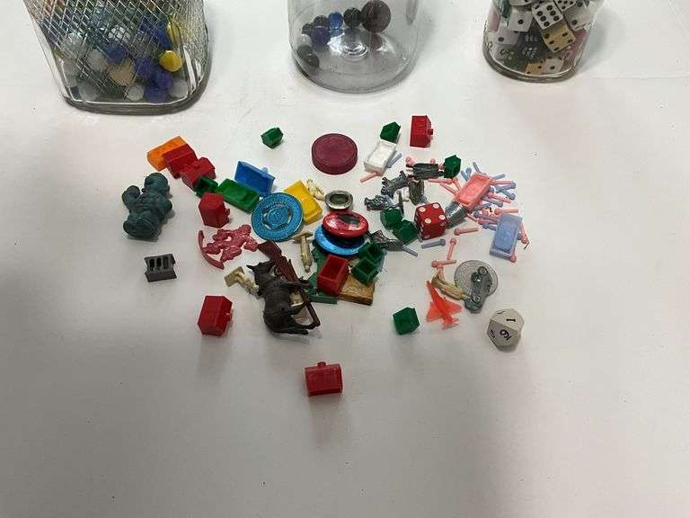 Jars of marbles, dice, and trinkets