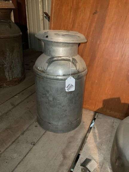 Milk can w/ lid, *** PLEASE NOTE: This item has no stair access and must be picked up on July 15th between 11:00-1:30PM. Item will be removed from loft for pickup.