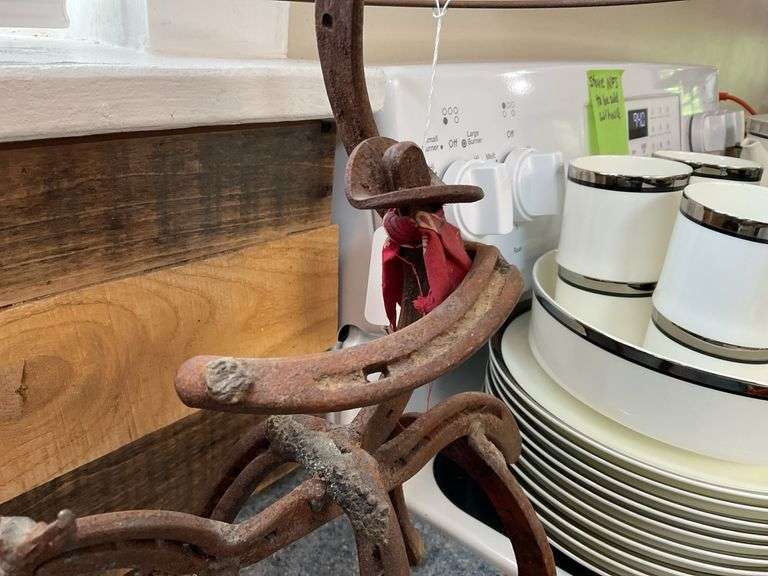 Wrought iron horseshoes cowboy on horse figure