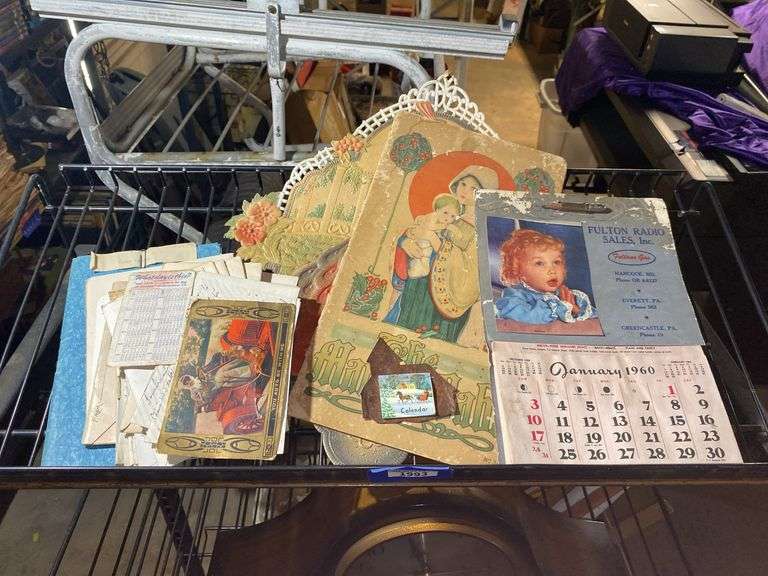 Paper ephemera including: postcards, child's Christmas book, 1960 advertising calendar