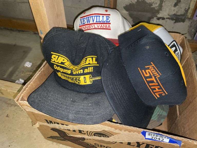 Box of baseball caps
