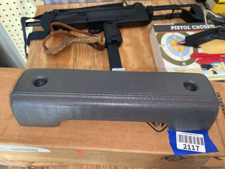 Two International arm rests in boxes