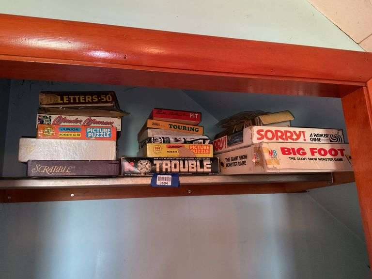 Contents of shelf: vintage games and puzzles