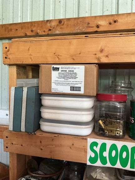 Contents of two shelves: hardware, trouble light