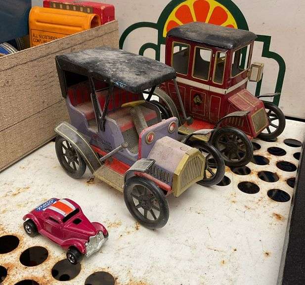 Two vintage litho tin lever action autos, and HotWheels Neet Streeter