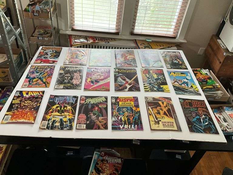 Comic books including: Spider-Man, Fantastic Four, Catwoman, Green Goblin