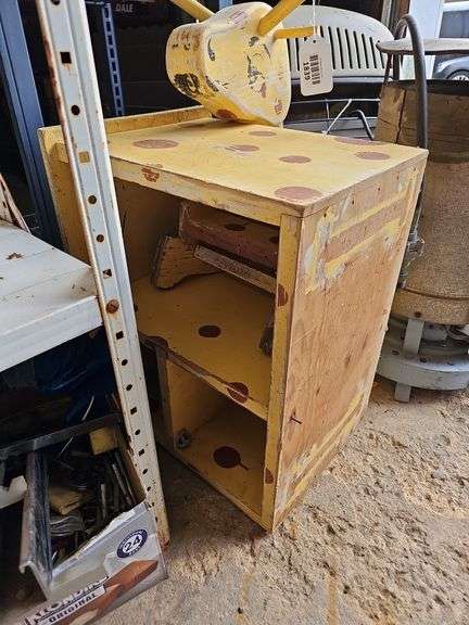 Painted giraffe shelf unit
