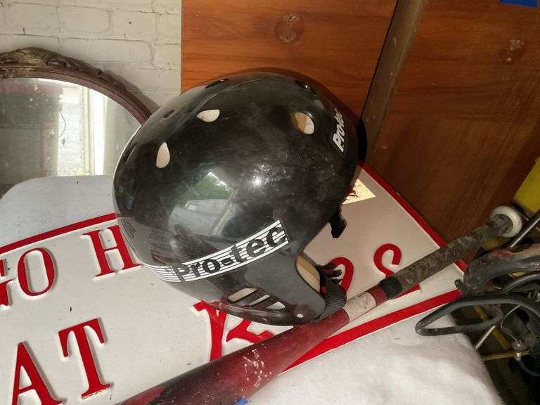 Pro-Tec skate helmet, GO HOGS sign, Louisville Slugger TPX baseball bat