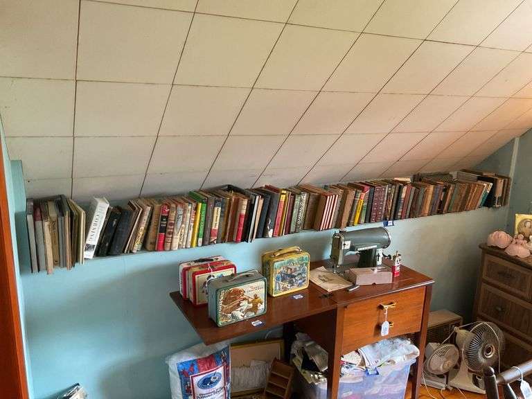Shelf of books: Happy Hollisters, older novels, misc