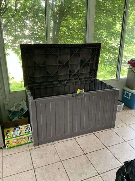Plastic storage chest and contents 49in long