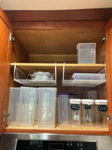 Contents of two shelves: plastic storage containers