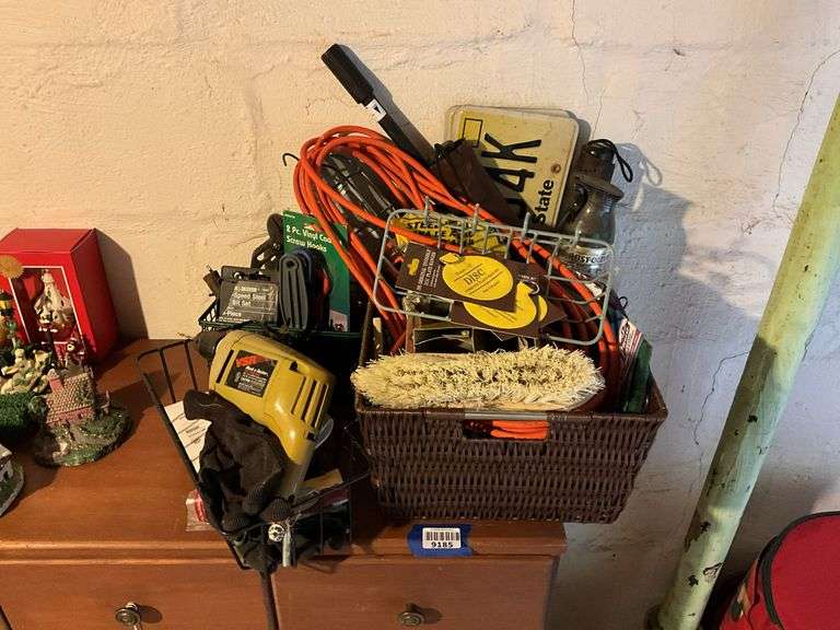 Black & Decker drill, drill bits, trouble light, scrub brush, basket, misc