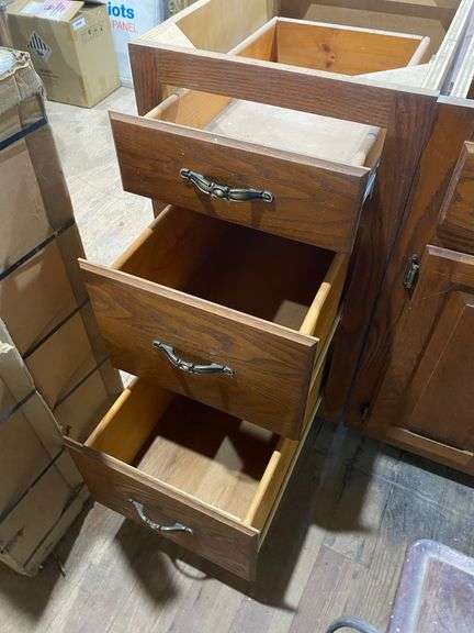 Two oak base cabinets 27x24x35 and 18x24x35