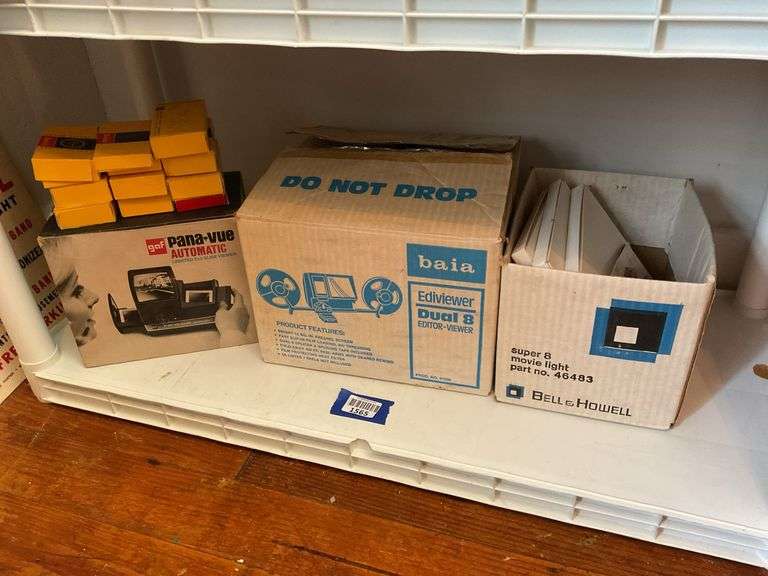Contents of shelf: Film editor, slide viewer, misc