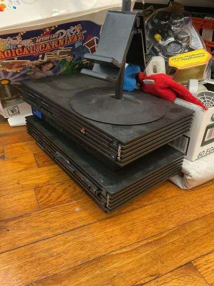 Sony PlayStation 2 consoles, Guitar Hero II, Wii, controllers, games, and accessories