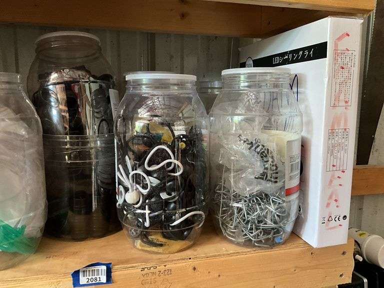 Contents of shelf: jars of hardware, ball ties, misc