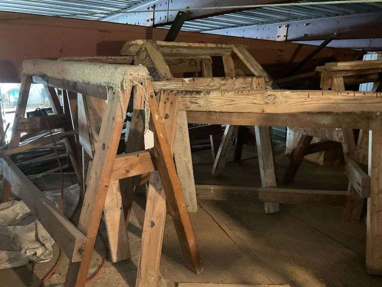 Lot of wooden sawhorses, *** PLEASE NOTE: This item has no stair access and must be picked up on July 15th between 11:00-1:30PM. Item will be removed from loft for pickup.