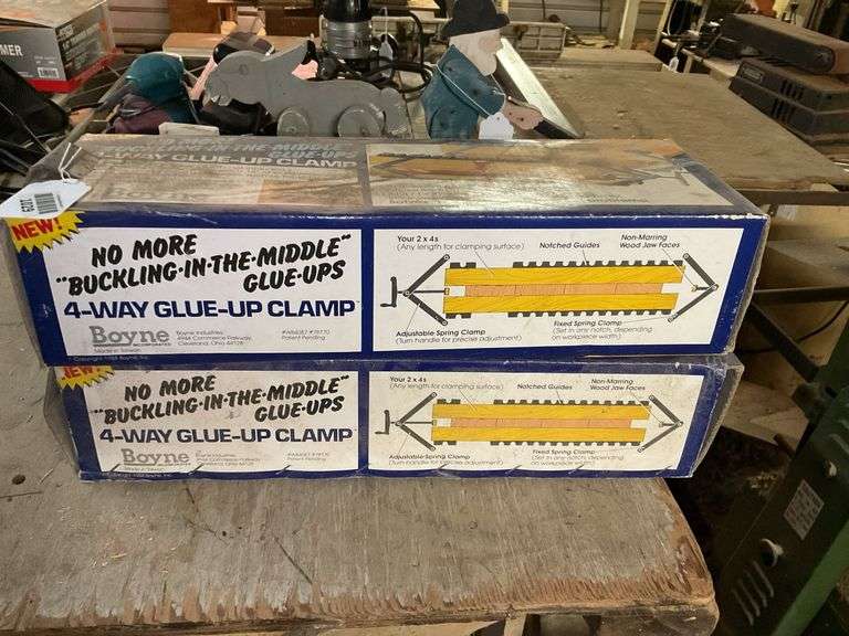 Two 4-way glue-up clamps in boxes