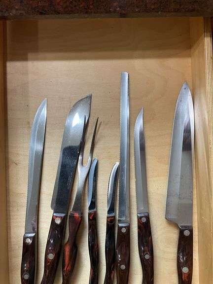 Contents of drawer: Cutco kitchen knives and carving fork