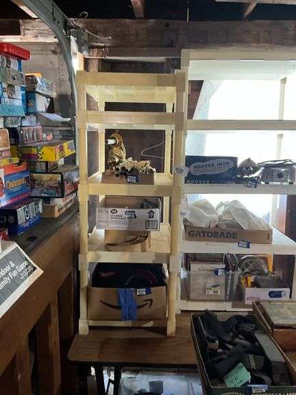 White plastic shelf unit - no contents