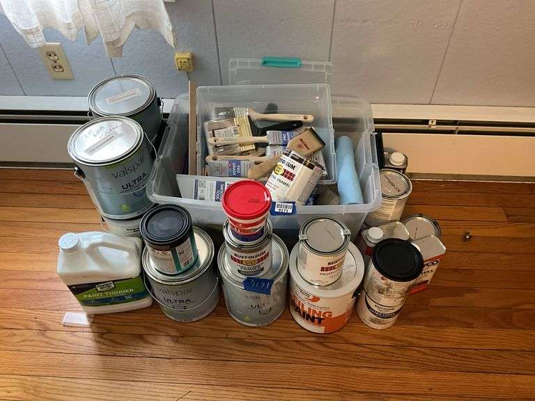 New paint brushes, scraper, paints, painting supplies