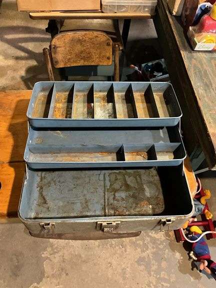 Contents of shelf: tackle boxes