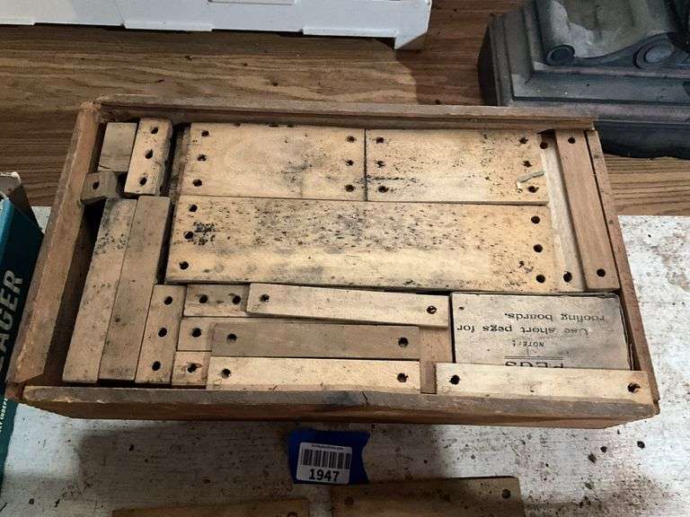 Antique toy wooden building set in wooden box w/ paper print on top of lid