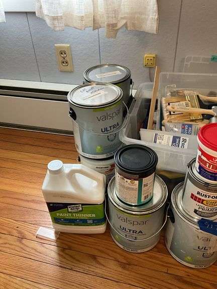 New paint brushes, scraper, paints, painting supplies
