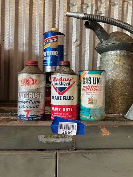 Vintage automotive advertising tins