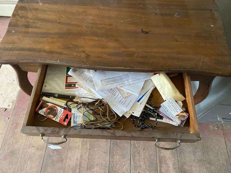 Turn-of-the-century library table w/ drawer in apron, sawn cabriole legs. Contents of drawer included  36x24x29