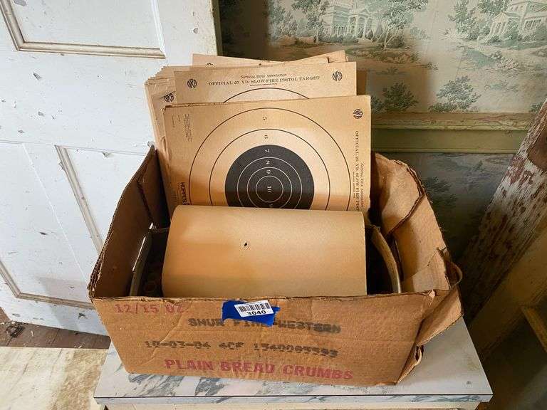 Base cabinet w/ formica top, NRA pistol targets, shot shells 20.5x17x28